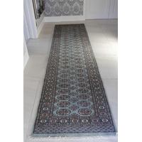 green pakistan mori oriental runner rug