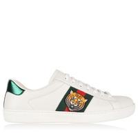 gucci web tiger low top trainers