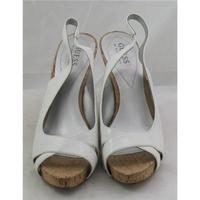 Guess by Marciano, size 7 white cork wedge heeled platform sandals