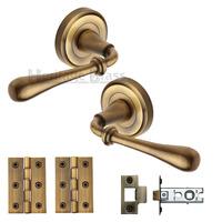 heritage brass lever latch round rose roma antique finish