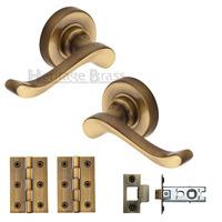 heritage brass lever latch round rose bedford antique finish