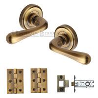 heritage brass lever latch round rose charlbury antique finish