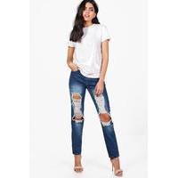 heavily distressed boyfriend jeans indigo