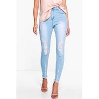 high waisted destroyed hem skinny jeans blue