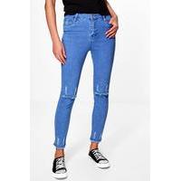 high rise destroyed knee hem skinny jeans dark blue