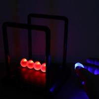 Illuminated Newtons Cradle