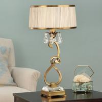 Interiors 1900 63523 Oksana Antique Brass Medium Table Lamp In Brass With Beige Shade - Height: 610mm
