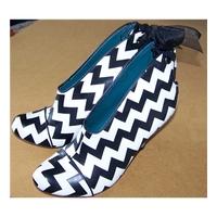 Irregular Choices Size: 7/8 (42) black and white zig zag ankle boot