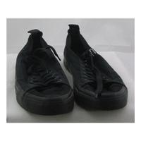 Issey Miyake, size 10 black canvas lace up plimsolls