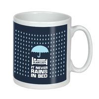 IT NEVER RAINS IN BED MUG