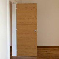 JBK Royale Modern VT5 Oak Fire Door is 1/2 Hour Fire Rated and Pre-Finished
