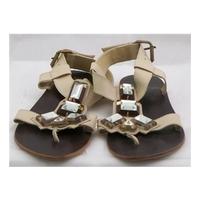 KG, size 4 cream thonged sandals with gem stones