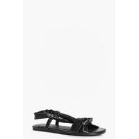 knotted cross strap flat sandal black