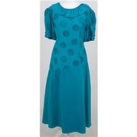 Laura Phillips Size:16 turquoise frilled dress