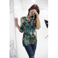 Lavina tropical print dipped hem blouse