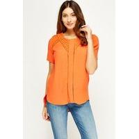 Laser Cut Trim Dip Hem Top