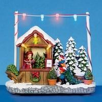 led christmas shop with child and christmas trees