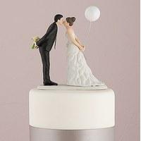 leaning in for a kiss balloon wedding cake topper