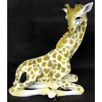 lesser and pavey 31 cm sitting giraffe figurine brownwhite