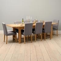 light oak 220 265 310cm ext table and 8 grey chairs