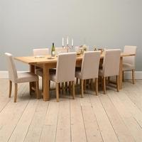 light oak 220 265 310cm ext table and 8 linen chairs