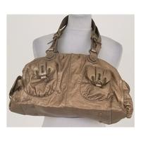 liz claiborne antique gold coloured slouch style handbag