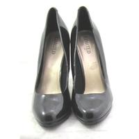 limited collection size 85 black patent effect court shoes