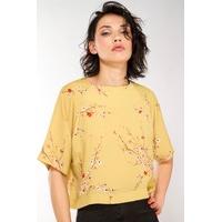 Liquorish Sakura Flower Yellow Printed Crop Top