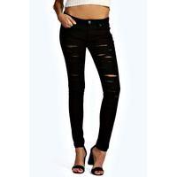 Low Rise All Over Rip Skinny Jeans - black