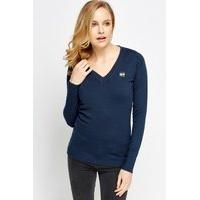 logo front v neck jumper