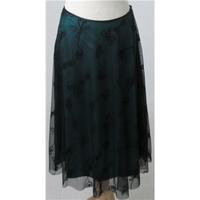 M and Co Size: 10 green & black netted calf length skirt