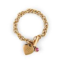 matte gold toggle charm bracelet with gemstone charm ruby july