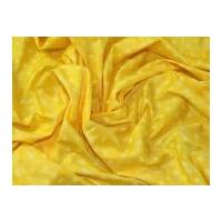 marble star print cotton poplin dress fabric yellow