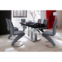 massimo extending black glass table with 8 black chairs