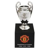 manchester united past winners champions of europe 70mm trophy on wood ...