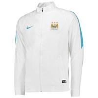 manchester city revolution woven track jacket