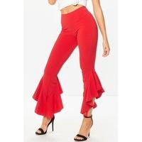 maya red asymmetric frill hem trousers