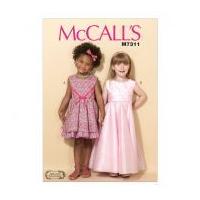 mccalls girls easy sewing pattern 7311 sleeveless dresses belt