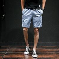 mens mid rise micro elastic shorts pants simple straight solid