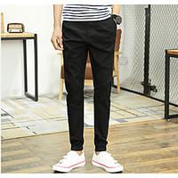 mens mid rise micro elastic chinos pants simple slim solid