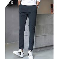 mens mid rise micro elastic chinos pants simple slim harem solid