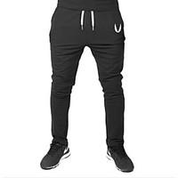 mens medium waist micro elastic skinny pants simple harem pure color s ...