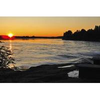Midsummer Special: Evening Riverboat Cruise, Dinner and Midnight Sun Experience from Rovaniemi