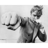 Michael Caine Punching from the Getty Images Archive