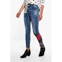 Mid Rise Floral Embroidered Skinny Jeans - mid blue