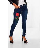 Mid Rise Floral Applique Skinny Jeans - mid blue