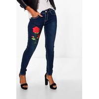 mid rise floral applique skinny jeans mid blue