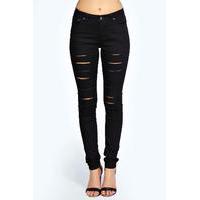 mid rise cut leg ripped skinny jeans black