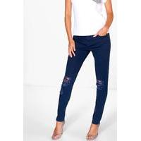 mid rise busted knee skinny jeans navy