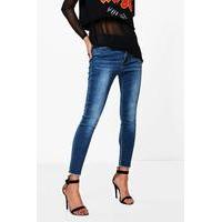 mid rise dark wash skinny jeans dark blue